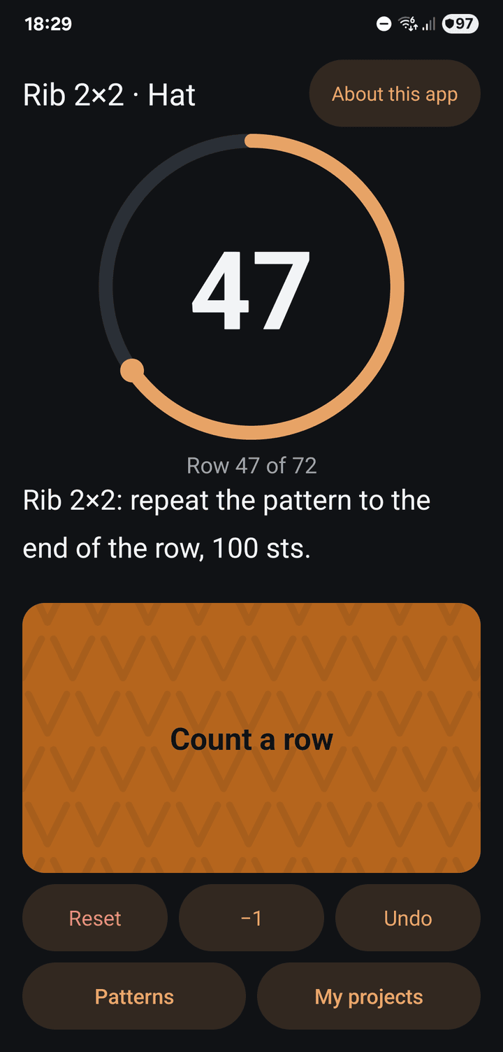 The row counter on row 47 of a 72-row hat pattern, with the instruction for that row