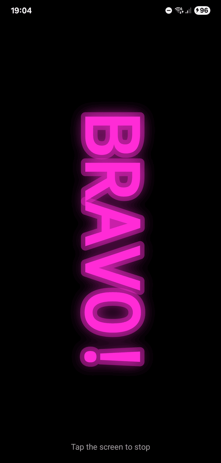 LED Banner showing BRAVO! in pink neon letters along the long side of the screen