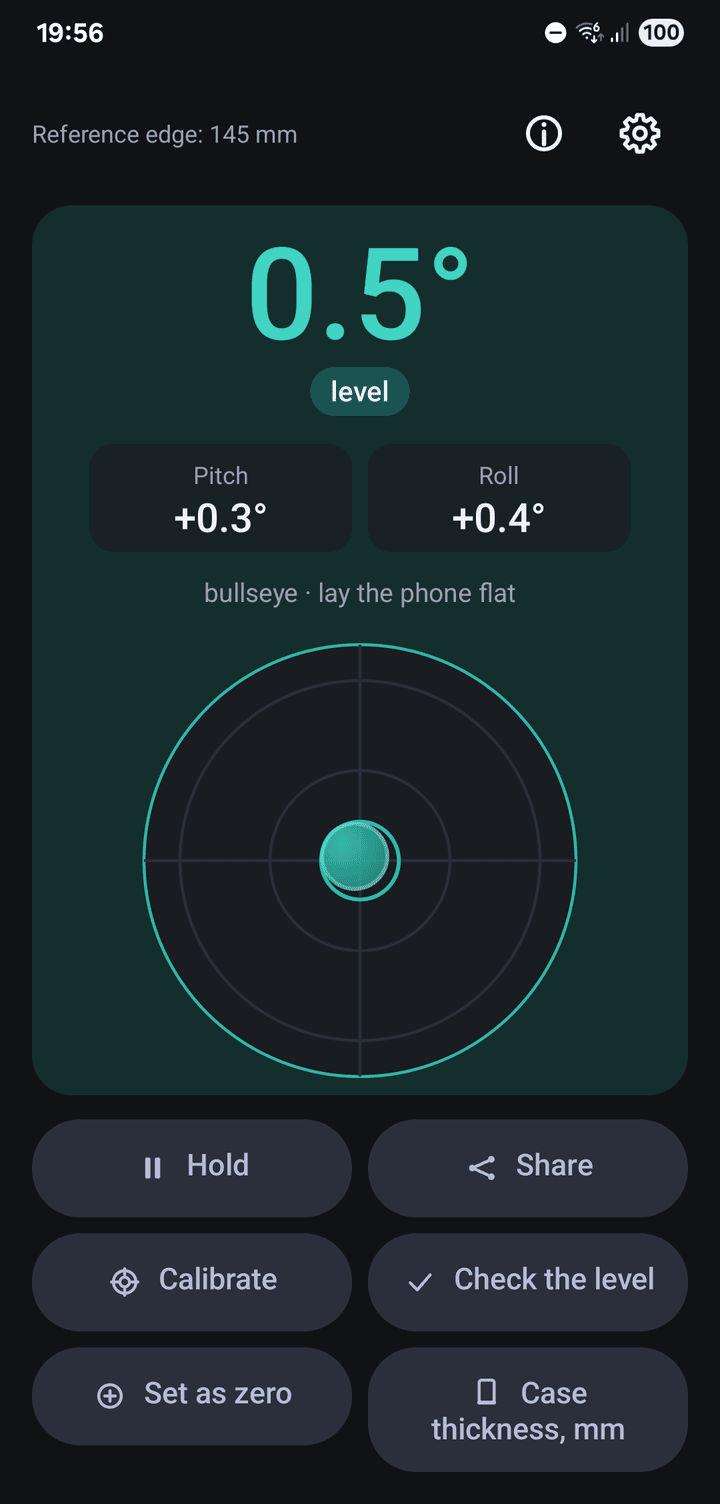 Level showing a bubble on a bullseye with the tilt in degrees