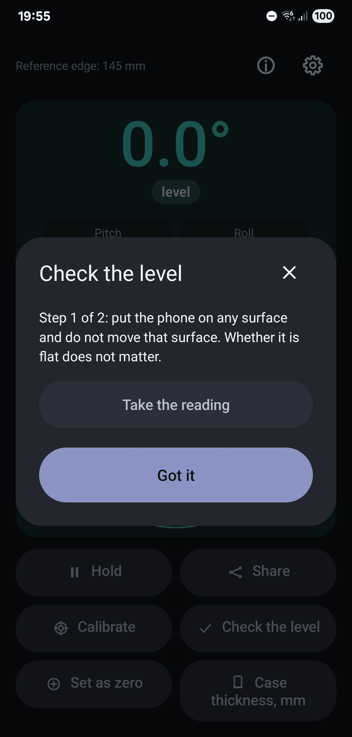 The accuracy check, step 1 of 2: put the phone on any surface and take a reading